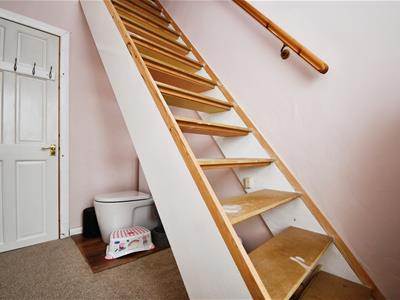 Bedroom three / cloakroom